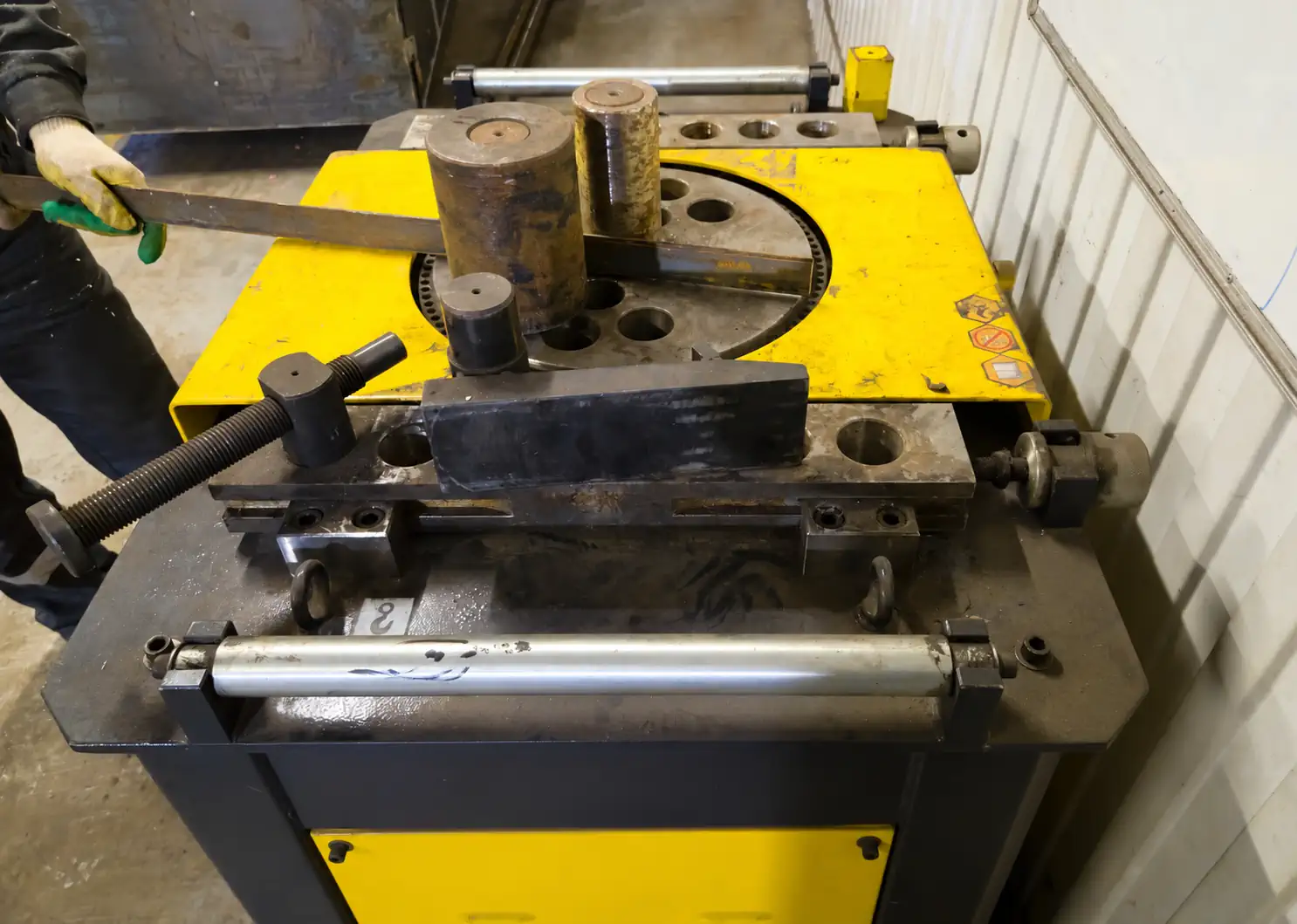 Bending a metal strip on a press brake while making Octoglass tooling